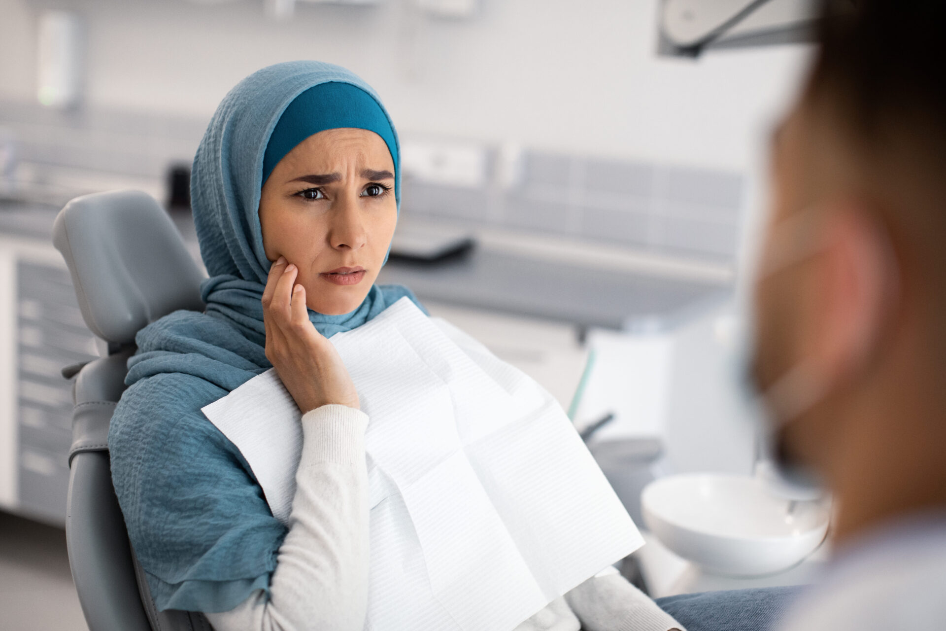 teeth problems muslim female in dentist chair sho 2022 12 16 09 16 48 utc 1