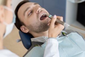 female dentist filling cavities 2023 11 27 05 20 26 utc 1