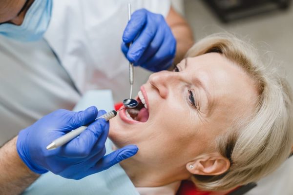patient-curing-caries-decay-visiting-doctor-dentis-2023-11-27-05-29-40-utc (1)