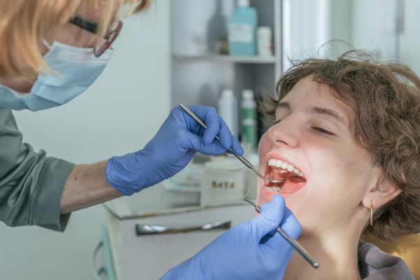 teenage-at-the-dentist-2023-11-27-05-23-48-utc